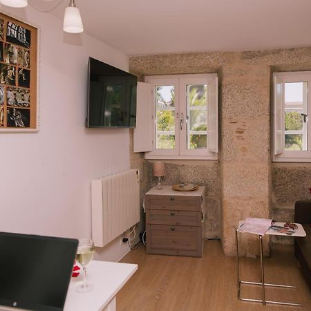 Roompedra Apartamentos Turisticos ซานติอาโก เด กอมโปสเตลา ภายนอก รูปภาพ