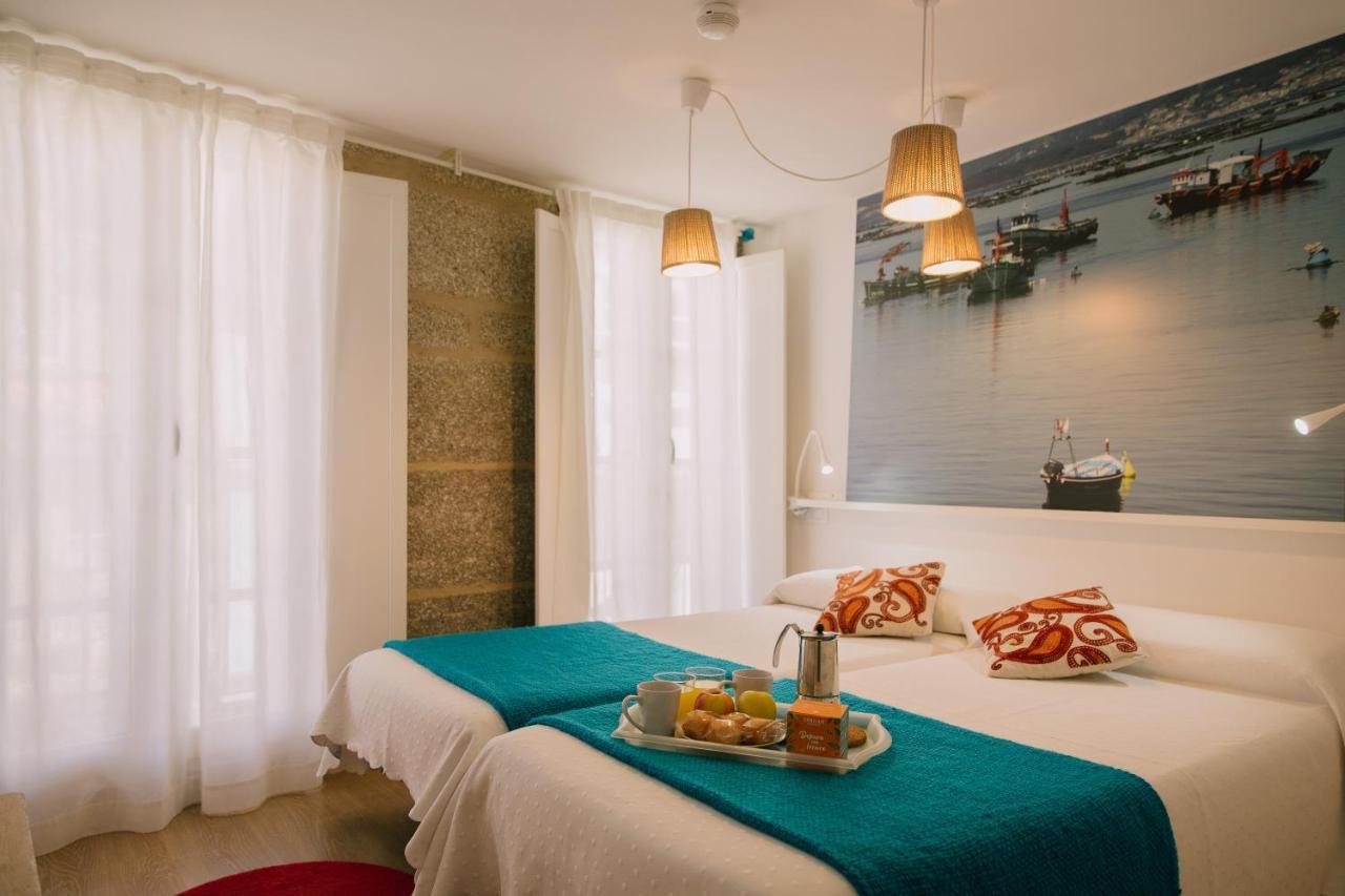 Roompedra Apartamentos Turisticos ซานติอาโก เด กอมโปสเตลา ภายนอก รูปภาพ