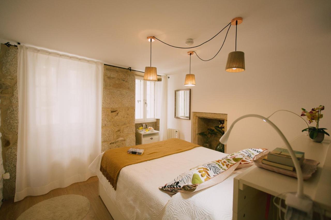 Roompedra Apartamentos Turisticos ซานติอาโก เด กอมโปสเตลา ภายนอก รูปภาพ