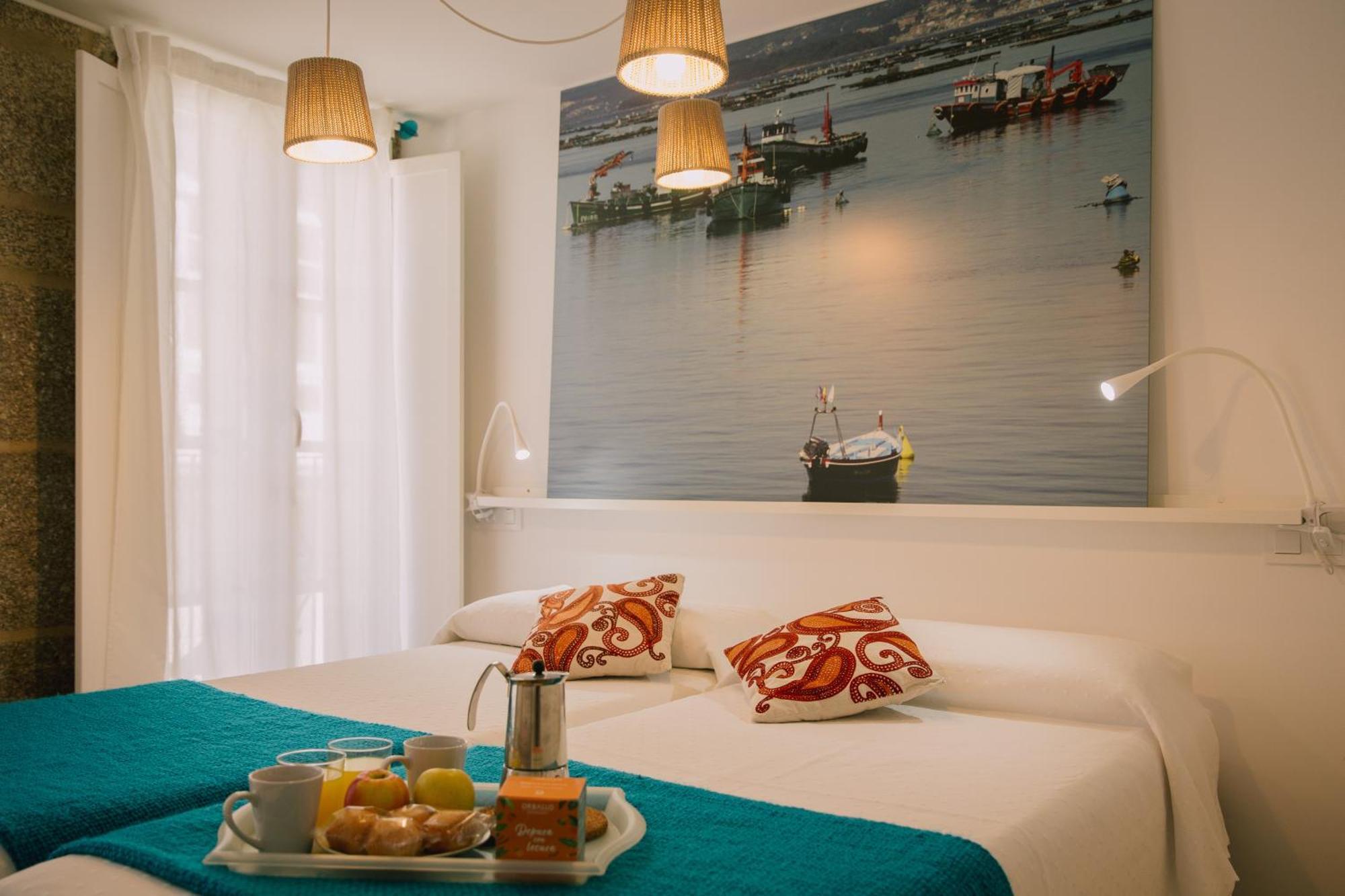 Roompedra Apartamentos Turisticos ซานติอาโก เด กอมโปสเตลา ภายนอก รูปภาพ